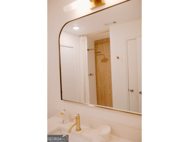 Step inside this one-of-a-kind mid-century home overlooking on Newnan Country Club in Georgia - for sale on GolfHomes.com, golf home, golf lot