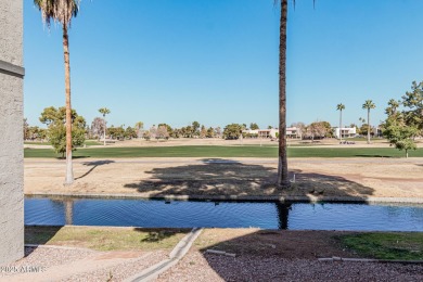 Stunning tri-level, gated waterfront townhome in Dobson Ranch's on Dobson Ranch Municipal Golf Course in Arizona - for sale on GolfHomes.com, golf home, golf lot