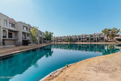 Stunning tri-level, gated waterfront townhome in Dobson Ranch's on Dobson Ranch Municipal Golf Course in Arizona - for sale on GolfHomes.com, golf home, golf lot