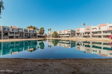 Stunning tri-level, gated waterfront townhome in Dobson Ranch's on Dobson Ranch Municipal Golf Course in Arizona - for sale on GolfHomes.com, golf home, golf lot