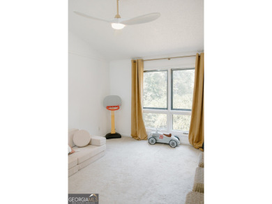 Step inside this one-of-a-kind mid-century home overlooking on Newnan Country Club in Georgia - for sale on GolfHomes.com, golf home, golf lot