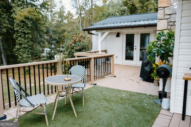 Step inside this one-of-a-kind mid-century home overlooking on Newnan Country Club in Georgia - for sale on GolfHomes.com, golf home, golf lot