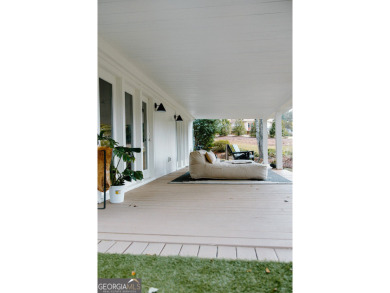 Step inside this one-of-a-kind mid-century home overlooking on Newnan Country Club in Georgia - for sale on GolfHomes.com, golf home, golf lot