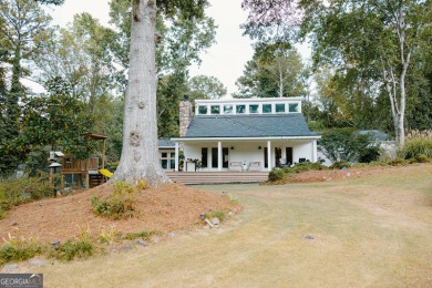 Step inside this one-of-a-kind mid-century home overlooking on Newnan Country Club in Georgia - for sale on GolfHomes.com, golf home, golf lot