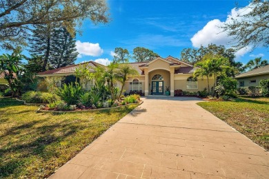 Indulge in unparalleled views of the tranquil lake and verdant on Calusa Lakes Golf Club in Florida - for sale on GolfHomes.com, golf home, golf lot