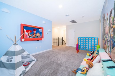 Welcome to this stunning 6 Bedrooms & 5 Bathroom Vacation Home on ChampionsGate Golf Resort in Florida - for sale on GolfHomes.com, golf home, golf lot