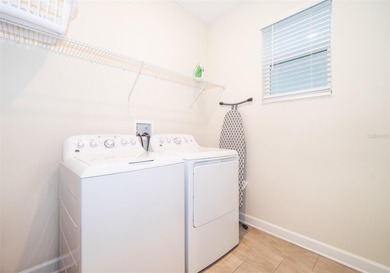 Welcome to this stunning 6 Bedrooms & 5 Bathroom Vacation Home on ChampionsGate Golf Resort in Florida - for sale on GolfHomes.com, golf home, golf lot