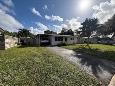 3/2 waterfront pool home in desirable Cooper City. Open-concept on Cooper Colony Country Club in Florida - for sale on GolfHomes.com, golf home, golf lot