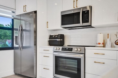 Discover this stunning fully renovated 2 bed / 2 bath top-floor on Boca Lago Golf and Country Club in Florida - for sale on GolfHomes.com, golf home, golf lot