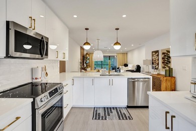 Discover this stunning fully renovated 2 bed / 2 bath top-floor on Boca Lago Golf and Country Club in Florida - for sale on GolfHomes.com, golf home, golf lot