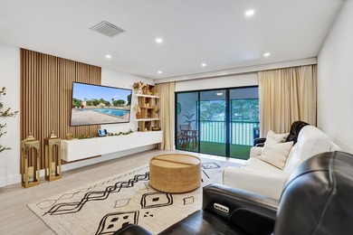 Discover this stunning fully renovated 2 bed / 2 bath top-floor on Boca Lago Golf and Country Club in Florida - for sale on GolfHomes.com, golf home, golf lot