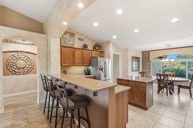 Nestled on a spectacular golf course homesite, this beautifully on Quail Creek Country Club  in Arizona - for sale on GolfHomes.com, golf home, golf lot