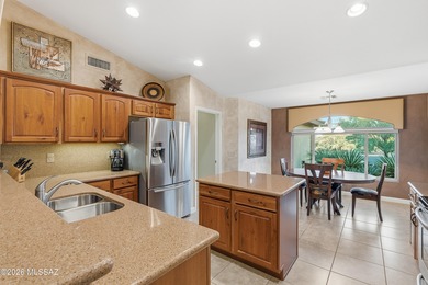 Nestled on a spectacular golf course homesite, this beautifully on Quail Creek Country Club  in Arizona - for sale on GolfHomes.com, golf home, golf lot