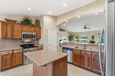 Nestled on a spectacular golf course homesite, this beautifully on Quail Creek Country Club  in Arizona - for sale on GolfHomes.com, golf home, golf lot