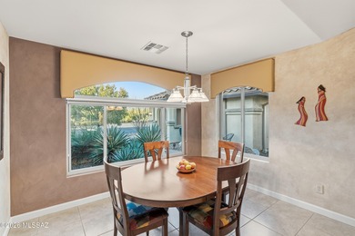 Nestled on a spectacular golf course homesite, this beautifully on Quail Creek Country Club  in Arizona - for sale on GolfHomes.com, golf home, golf lot