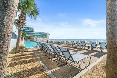 This beautifully renovated 2BR/2BA beachfront condo offers on Holiday Golf Club in Florida - for sale on GolfHomes.com, golf home, golf lot