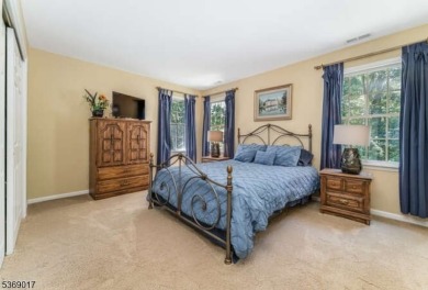 Set on a private cul-de-sac, this beautifully designed home on Stanton Ridge Golf and Country Club in New Jersey - for sale on GolfHomes.com, golf home, golf lot