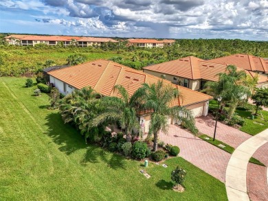 Dramatic price reduction on this gorgeous end unit villa located on Sarasota National Golf Club in Florida - for sale on GolfHomes.com, golf home, golf lot