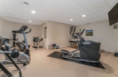 Set on a private cul-de-sac, this beautifully designed home on Stanton Ridge Golf and Country Club in New Jersey - for sale on GolfHomes.com, golf home, golf lot
