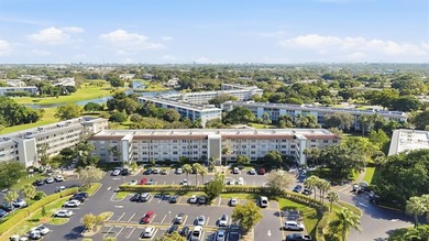 Step into this fully updated, move-in-ready gem in the highly on Wynmoor Golf Course in Florida - for sale on GolfHomes.com, golf home, golf lot