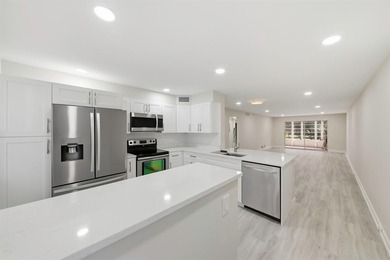 Step into this fully updated, move-in-ready gem in the highly on Wynmoor Golf Course in Florida - for sale on GolfHomes.com, golf home, golf lot