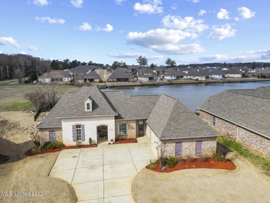 GORGEOUS PROPERTY MADE AVAILABLE DUE TO CORPORATE RELOCATION on Lake Caroline Golf Club in Mississippi - for sale on GolfHomes.com, golf home, golf lot