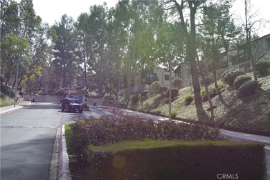 Upper level, one bedroom condo that feels like a tree house with on Diamond Bar Golf Course in California - for sale on GolfHomes.com, golf home, golf lot