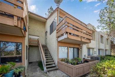 Upper level, one bedroom condo that feels like a tree house with on Diamond Bar Golf Course in California - for sale on GolfHomes.com, golf home, golf lot