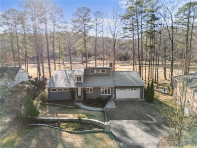 The perfect home for those that love to relax. This single-story on Carolina Trace Country Club in North Carolina - for sale on GolfHomes.com, golf home, golf lot