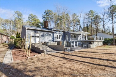The perfect home for those that love to relax. This single-story on Carolina Trace Country Club in North Carolina - for sale on GolfHomes.com, golf home, golf lot