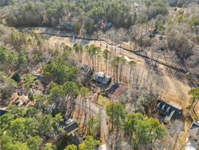 The perfect home for those that love to relax. This single-story on Carolina Trace Country Club in North Carolina - for sale on GolfHomes.com, golf home, golf lot