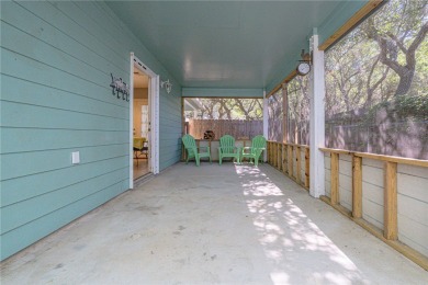 Nestled beneath large shade oak trees, this fully furnished on Rockport Country Club in Texas - for sale on GolfHomes.com, golf home, golf lot