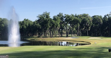 Beautiful wooded lot nestled within the exclusive on The Golf Club At Sanctuary Cove in Georgia - for sale on GolfHomes.com, golf home, golf lot