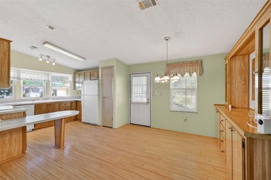 Located in beautiful Fox Run, this 2-bedroom 2-bath home on Bay Tree Golf Course in Florida - for sale on GolfHomes.com, golf home, golf lot