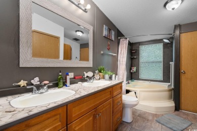 Welcome to 1038 Palm Drive, a delightful 3-bedroom, 2-bathroom on Wild Wing Plantation in South Carolina - for sale on GolfHomes.com, golf home, golf lot