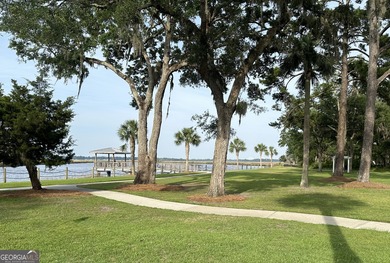 Beautiful wooded lot nestled within the exclusive on The Golf Club At Sanctuary Cove in Georgia - for sale on GolfHomes.com, golf home, golf lot