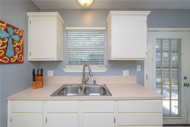 Nestled beneath large shade oak trees, this fully furnished on Rockport Country Club in Texas - for sale on GolfHomes.com, golf home, golf lot