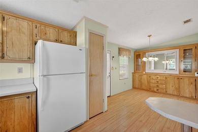 Located in beautiful Fox Run, this 2-bedroom 2-bath home on Bay Tree Golf Course in Florida - for sale on GolfHomes.com, golf home, golf lot