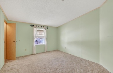 Located in beautiful Fox Run, this 2-bedroom 2-bath home on Bay Tree Golf Course in Florida - for sale on GolfHomes.com, golf home, golf lot