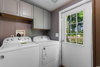 Welcome to 1038 Palm Drive, a delightful 3-bedroom, 2-bathroom on Wild Wing Plantation in South Carolina - for sale on GolfHomes.com, golf home, golf lot
