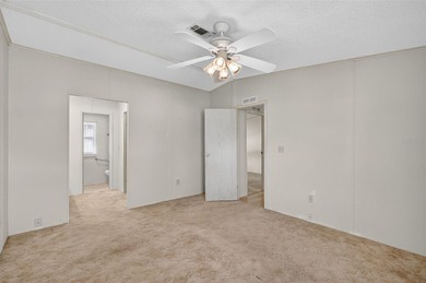 Located in beautiful Fox Run, this 2-bedroom 2-bath home on Bay Tree Golf Course in Florida - for sale on GolfHomes.com, golf home, golf lot