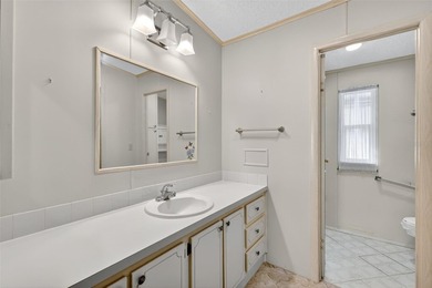 Located in beautiful Fox Run, this 2-bedroom 2-bath home on Bay Tree Golf Course in Florida - for sale on GolfHomes.com, golf home, golf lot