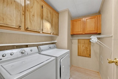 Located in beautiful Fox Run, this 2-bedroom 2-bath home on Bay Tree Golf Course in Florida - for sale on GolfHomes.com, golf home, golf lot