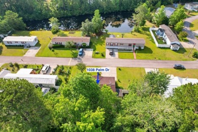 Welcome to 1038 Palm Drive, a delightful 3-bedroom, 2-bathroom on Wild Wing Plantation in South Carolina - for sale on GolfHomes.com, golf home, golf lot