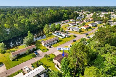 Welcome to 1038 Palm Drive, a delightful 3-bedroom, 2-bathroom on Wild Wing Plantation in South Carolina - for sale on GolfHomes.com, golf home, golf lot