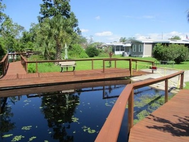 Located in beautiful Fox Run, this 2-bedroom 2-bath home on Bay Tree Golf Course in Florida - for sale on GolfHomes.com, golf home, golf lot