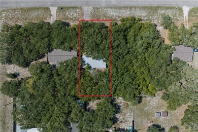 Nestled beneath large shade oak trees, this fully furnished on Rockport Country Club in Texas - for sale on GolfHomes.com, golf home, golf lot