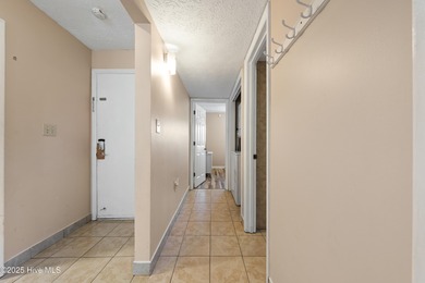 Your slice of paradise awaits! This tastefully furnished on Oak Island Golf Club in North Carolina - for sale on GolfHomes.com, golf home, golf lot