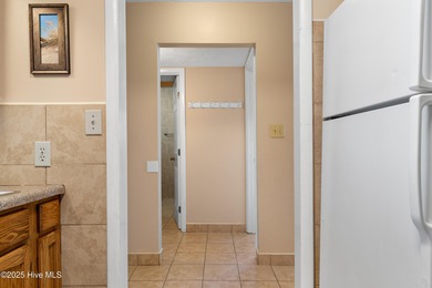 Your slice of paradise awaits! This tastefully furnished on Oak Island Golf Club in North Carolina - for sale on GolfHomes.com, golf home, golf lot