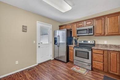 This 2-bedroom, 1.5-bathroom condo overlooks the pristine waters on Holiday Island Executive Golf Course in Arkansas - for sale on GolfHomes.com, golf home, golf lot